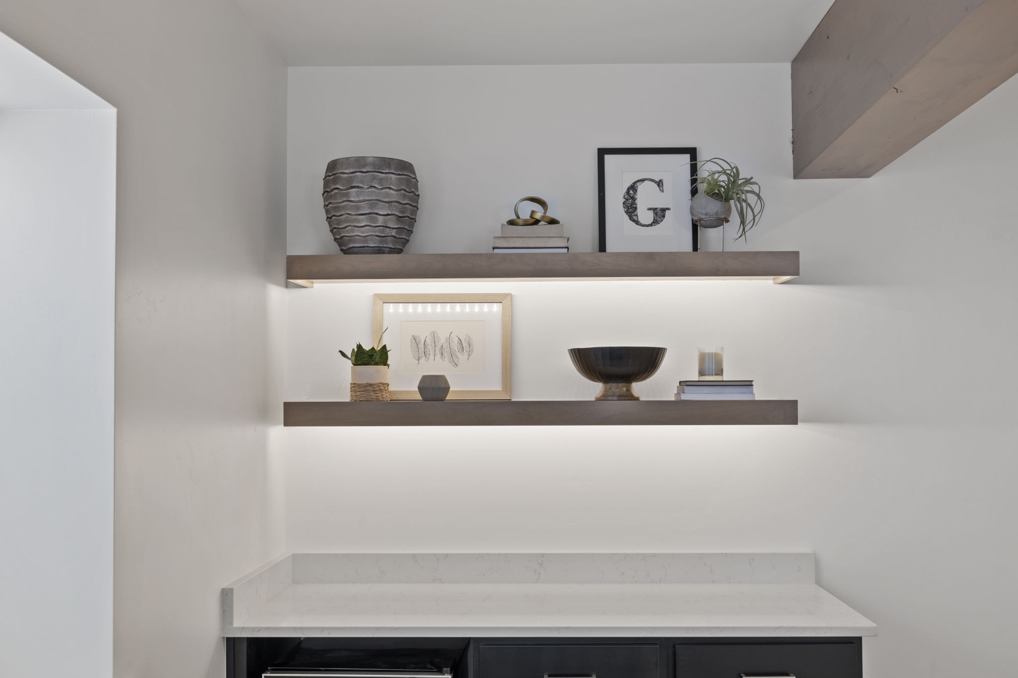 Built-in shelving with accent lighting